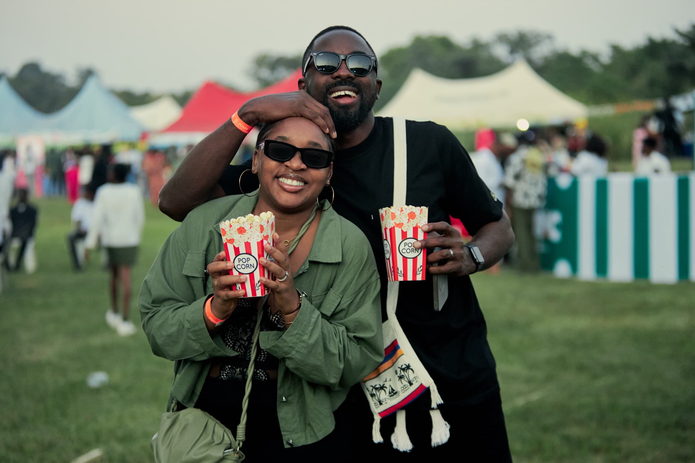 Friends with popcorn on the lawn
